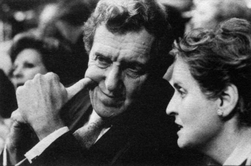 Senator Muskie listens to Madeleine Albright
