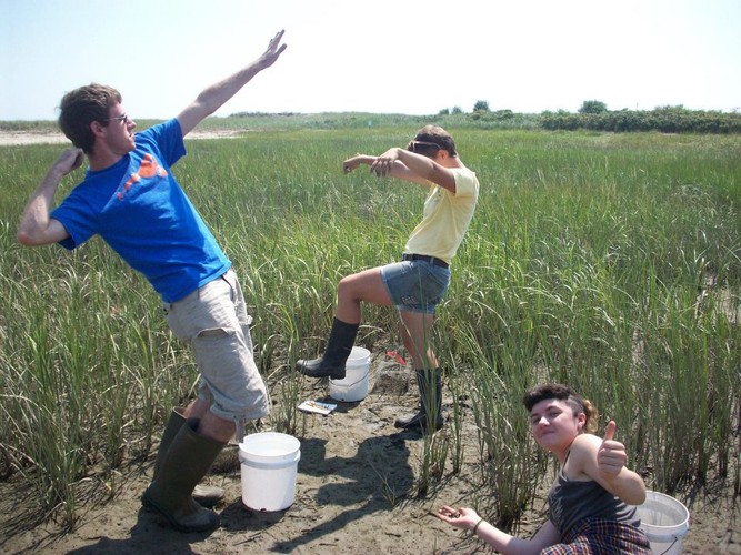 Tim, Emily and Ciara pose as they clear out crab traps.